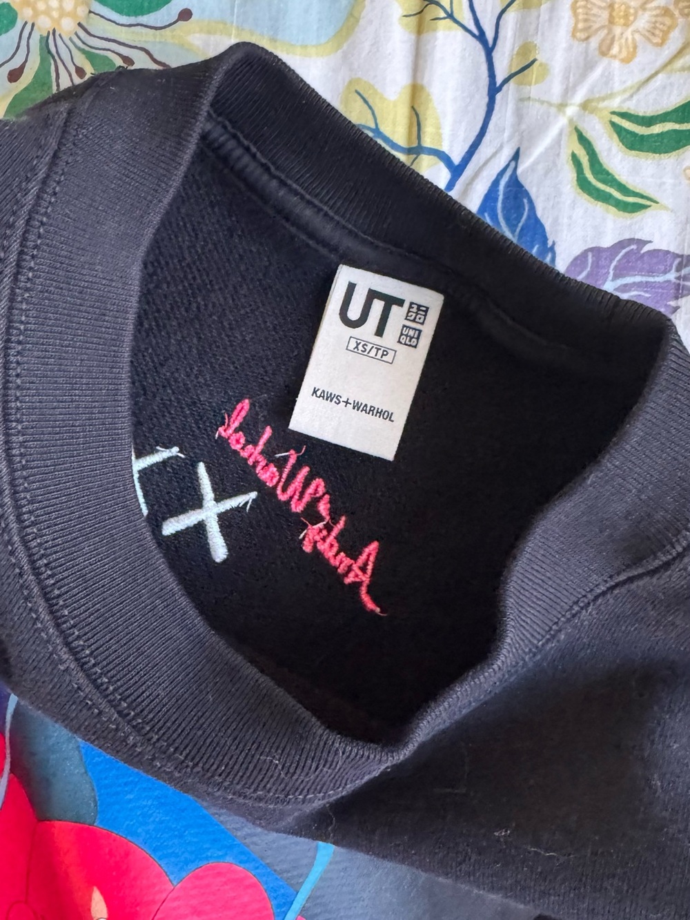Uniqlo x KAWS Black Crewneck Sweater with Bright Graphic Accents